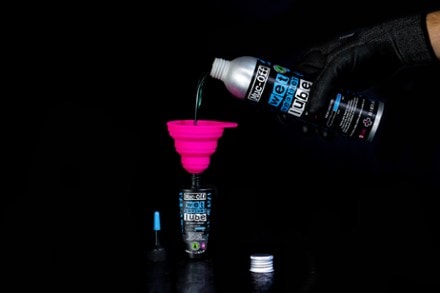 Muc-Off Wet Lube 300 ml Refill Small bottle and funnel not included