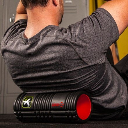Trigger Point Performance GRID X Foam Roller In Use (Black)