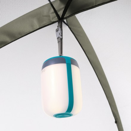 REI Co-op Westward 6 Tent Light (not included) hung on gear loop