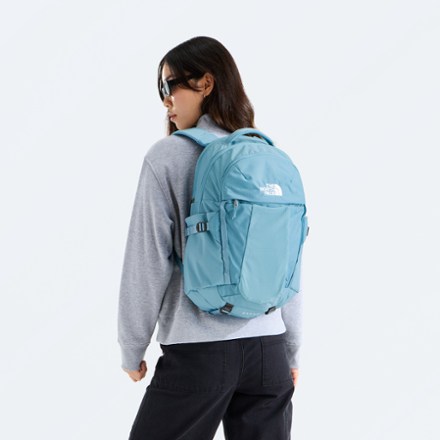 light blue backpack north face The Women's Borealis Commuter Laptop Backpack, Virtual Blue/Indigo Plum, One Size and an updated The North Face Women's Recon