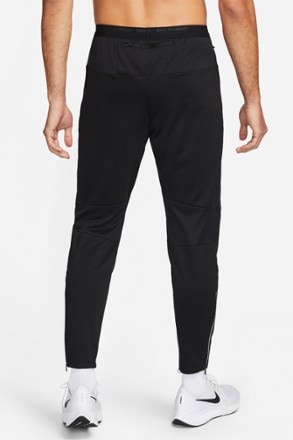 Nike Dri-FIT Fast Women's Mid-Rise 7/8 Warm-Up Running Trousers. Nike CA