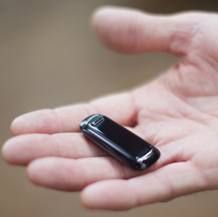 Fitbit in hand (Black)