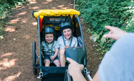 Depending on the trailer, bike trailers can fit up to two kids