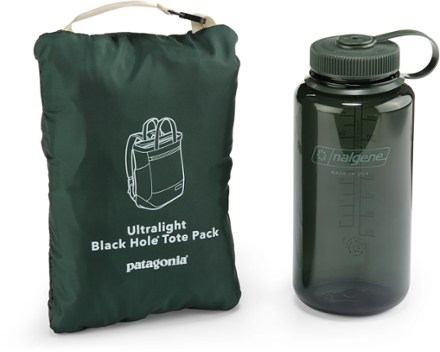 patagonia ultralight black hole tote pack - black – Trail Creek Outfitters Lightweight and durable black backpack made from 100% recycled ripstop nylon Patagonia Ultralight Black Hole Tote